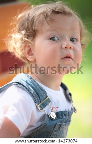 Similar – Happy little girl playing in a urban playground.