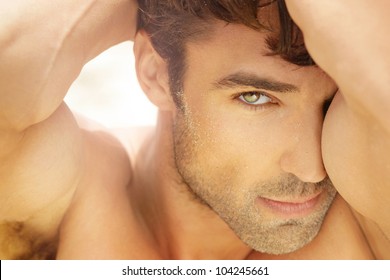 Closeup Portrait Of A Beautiful Male Model