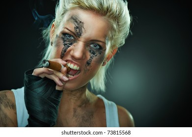 Closeup Portrait Of A Beautiful Young Caucasian Punk Woman With Dirty Face And Cigar In Her Mouth