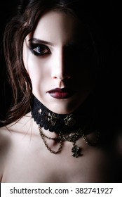 Closeup portrait of a beautiful young goth girl 