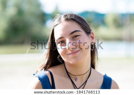 Similar – Image, Stock Photo Portrait of a beautiful young woman outdoor smiling