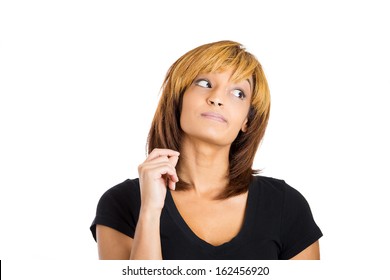 Closeup Portrait Of Beautiful Young Woman Looking Upwards Away Thinking About Problem And Uh Oh, What To Do Next. Isolated On White Background Copy Space. Negative Human Emotions Facial Expressions.