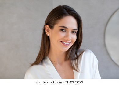 Closeup Portrait Of Beautiful Young Woman With Perfect Skin Looking At Camera, Attractive Millennial Female With Natural Makeup Looking And Smiling At Camera While Posing In Bathroom At Home