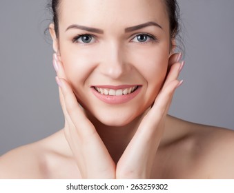 Close-up portrait of a beautiful young woman. Skin care concept. Natural look. Beauty portrait. Spa and health. - Shutterstock ID 263259302