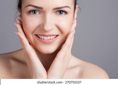 Close-up portrait of a beautiful young woman. Skin care concept. Natural look. Beauty portrait. Spa and health. - Shutterstock ID 270755537