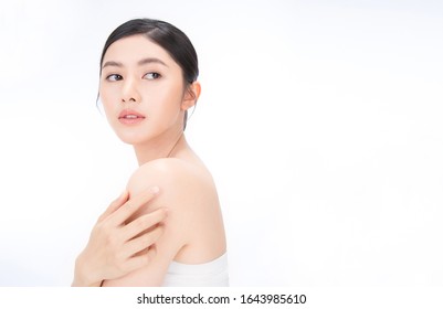 Closeup Portrait Of Beauty Asian Woman With Fair Perfect Healthy Glow Skin Hand Touch Shoulder Copy Space, Young Beautiful Asia Girl With Pretty Smile On Face. Beauty Korean Clinic Skincare Concept