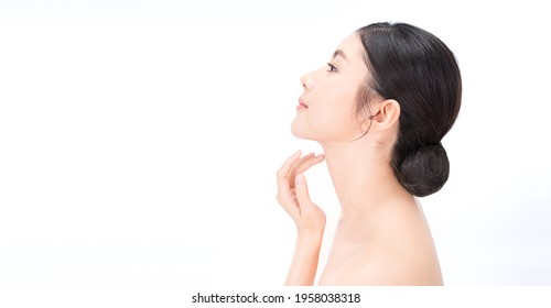 Closeup portrait of beauty asian woman with fair perfect healthy lift glow skin hand touching chin neck isolated on white, beautiful asia girl with pretty smile face. Beauty korean spa skincare banner