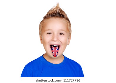 Closeup portrait of a boy showing tongue with british flag on it