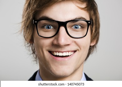 Close-up portrait of business man wearing nerd glasses