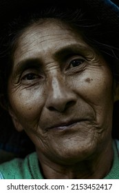 Closeup Portrait Of Cheerful Elderly Native American Female With Wrinkles On Face Smiling At Camera