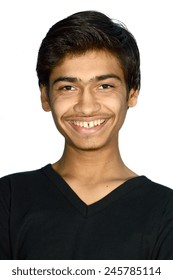 Close-up portrait of a cheerful young man isolated on white.