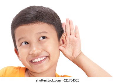 Closeup Portrait Child Hearing Something, Hand To Ear Gesture Isolated Grey Background.