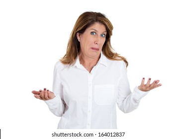 Closeup portrait of clueless, puzzled woman with arms out asking what's the problem, who cares, so what, I don't know, isolated on white background. Negative human emotion, facial expression, attitude