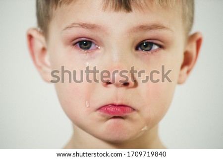 close-up portrait of a crying baby