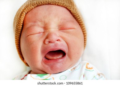 Closeup Portrait Of Cute Little Baby Boy Crying