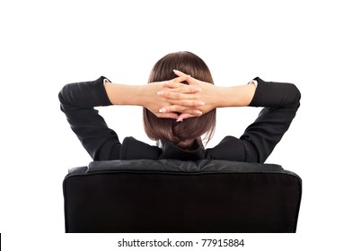 Closeup Portrait Of Cute Young Relaxed Business Woman From Behind With Open Hands Behind Her Head