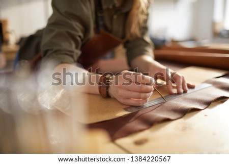 Similar – Image, Stock Photo Unrecognizable young woman crafting with paper and scissors