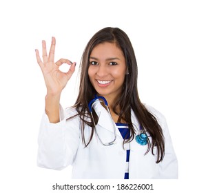 Closeup Portrait Friendly, Smiling Doctor With Stethoscope, Woman Health Care Professional Giving OK Sign, Isolated White Background. Patient Visit. Positive Face Expression, Emotion Attitude