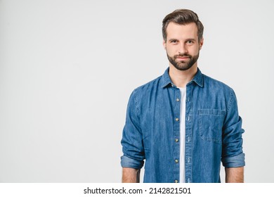 Closeup portrait of handsome caucasian young man boyfriend in denim casual clothes looking at camera isolated in white background - Powered by Shutterstock