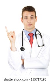 Closeup Portrait Of Handsome Young, Confident Male Health Care Professional, Doctor Or Nurse Or Dentist Pointing Up Isolated On White Background. Health Care Reform. Obamacare. Medicaid Reimbursement