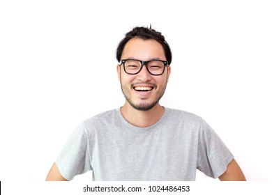 Closeup portrait of happy asian man face, isolated on white background with copy space.