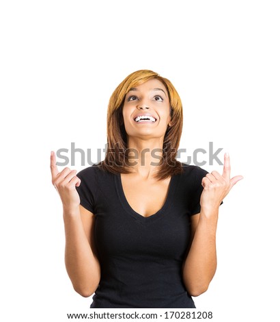Closeup portrait of happy beautiful woman pointing with index fingers and looking upwards above, isolated on white background.  Positive human emotion facial expression feelings.  Body language