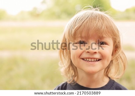 Similar – Small child with long blond hair