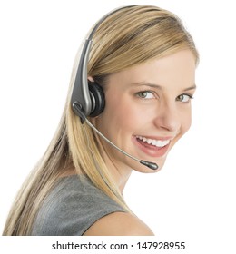 Close-up Portrait Of Happy Female Customer Service Representative Wearing Headset Isolated Over White Background