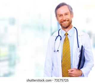 Closeup Portrait Of A Happy Senior Doctor With Stethoscope