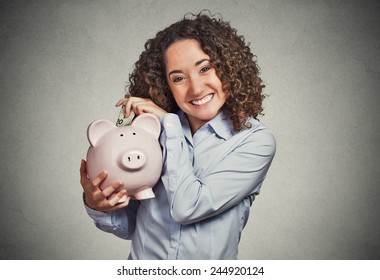 Closeup Portrait Happy Smiling Business Woman Bank Employee, Student Holding Piggy Bank, Excited To Open Savings Account Isolated Grey Background. Financial Concept. Positive Emotion Facial Expression