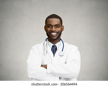 Closeup Portrait Happy Smiling Confident Male Healthcare Professional, Dentist, Pharmacist, Scientist, Researcher, Doctor, Nurse, Arms Crossed Isolated Black Background. Patient Care. Positive Emotion