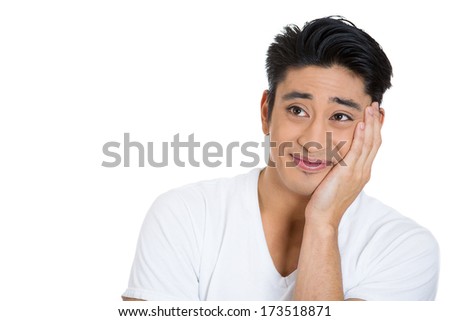 Closeup portrait of happy smiling handsome man looking upwards, in love, daydreaming of women, thinking about relationship isolated on white background. Positive emotions, facial expressions, feelings