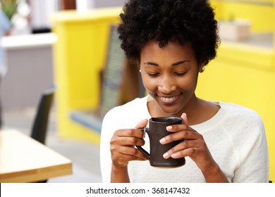 Closeup Portrait Of Happy Young Black Woman Drinking Coffee
