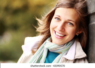 Closeup portrait of a happy young woman smiling - Shutterstock ID 43390570