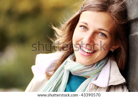 Closeup portrait of a happy young woman smiling