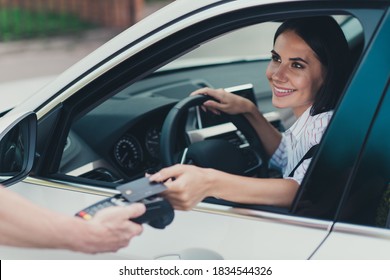 Close-up Portrait Of Her She Attractive Cheerful Content Successful Lady Consumer Riding Car Paying Virtual Money Cash Using Pay Pass Buying Goods Product Web Connection Transfer