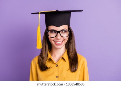 Close-up portrait of her she attractive cheerful cheery knowledgeable girl wearing graduate cap looking aside copy space isolated on bright vivid shine vibrant lilac violet color background - Powered by Shutterstock