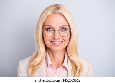 Close-up portrait of her she nice attractive lovely stylish content cheerful cheery wavy-haired lady skilled specialist shark consultant isolated on light white gray pastel background
