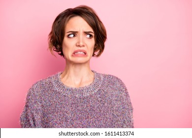Close-up portrait of her she nice attractive lovely pretty brown-haired girl unpleasant look reaction grimacing isolated over pink pastel color background