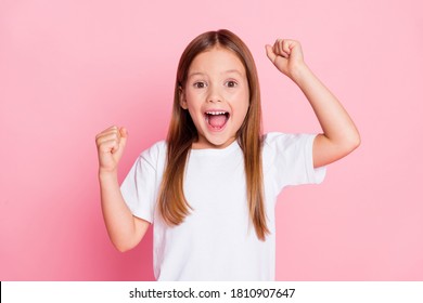 Close-up portrait of her she nice attractive lovely lucky red hair cheerful cheery girl rejoicing good great news having fun attainment isolated over pink pastel color background - Shutterstock ID 1810907647