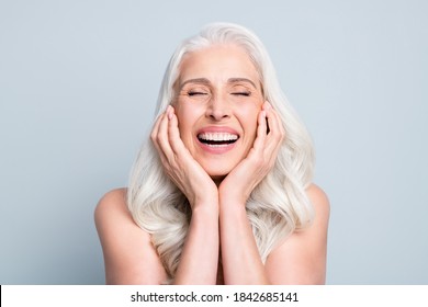 Close-up Portrait Of Her She Nice Attractive Excited Cheerful Grey-haired Elderly Lady Touching Cheeks Laughing Isolated Gray Pastel Color Background