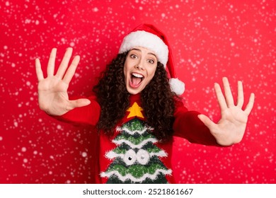 Close-up portrait of her she nice attractive lovely cute cheerful cheery wavy-haired Santa girl giving high five excellent advice isolated on bright vivid shine vibrant red color background