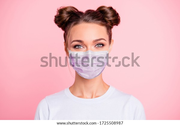 Close-up portrait of her she nice attractive lovable cute adorable winsome girl with two buns wear white shirt protection flu cold facial mask isolated over pink pastel background