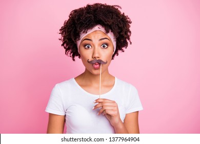 Close-up portrait of her she nice-looking charming cute attractive lovely amazed wavy-haired girl holding stick like mustache sending kiss you isolated over pink pastel background - Powered by Shutterstock