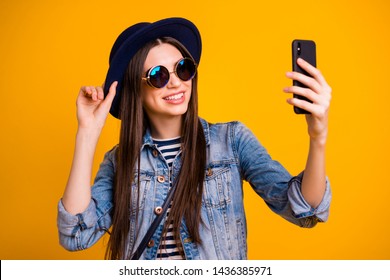 Close-up portrait of her she nice-looking charming attractive lovely winsome fascinating cheerful cheery straight-haired lady making taking selfie isolated over bright vivid shine yellow background