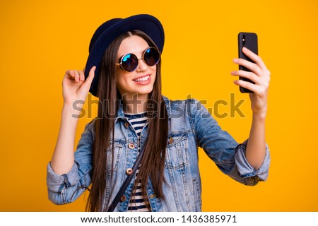 Close-up portrait of her she nice-looking charming attractive lovely winsome fascinating cheerful cheery straight-haired lady making taking selfie isolated over bright vivid shine yellow background