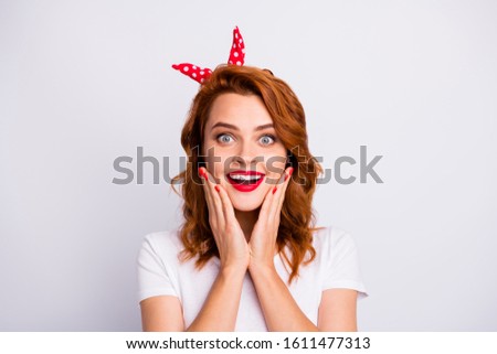 Close-up portrait of her she nice-looking attractive lovely winsome lovable charming cute amazed glad cheerful cheery girl good news reaction isolated over light white pastel color background
