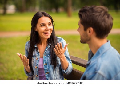 Close-up portrait of his he her she nice attractive lovely charming cute cheerful cheery friends wearing denim girl telling sharing news story spending free time in green wood forest outdoors - Shutterstock ID 1498900184