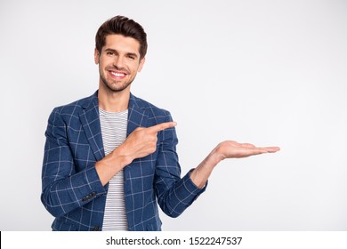Close-up portrait of his he nice attractive cheerful cheery businessman agent broker wearing checked blazer holding invisible object on palm advert decision isolated over light white pastel background