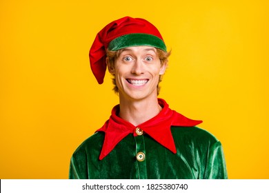 Close-up portrait of his he nice attractive cheerful cheery funny guy elf wearing festal clothes enjoying Eve Noel fairy isolated over bright vivid shine vibrant yellow color background